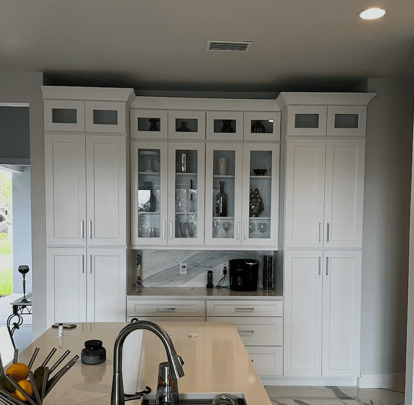 White shaker coffee bar with glass uppers