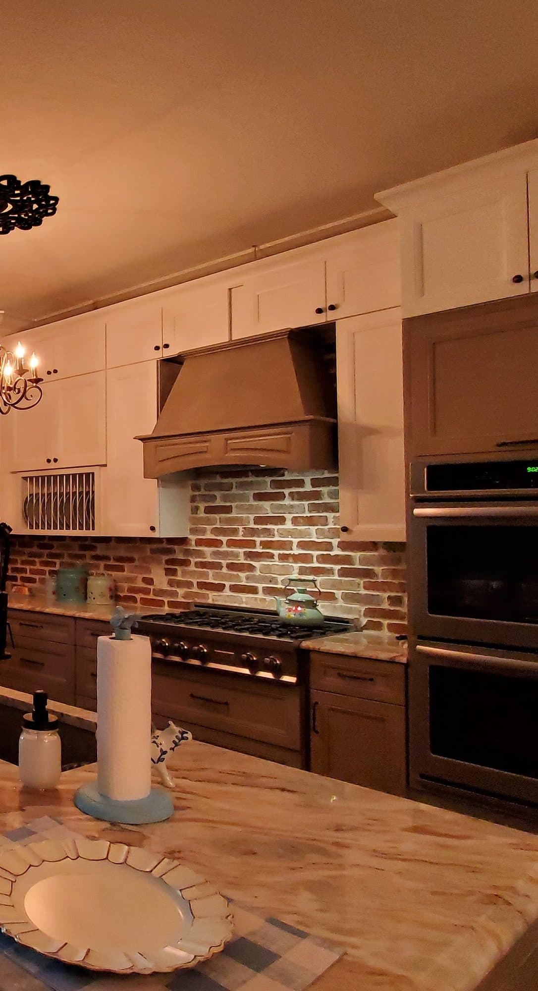 Two-Tone Kitchen with Wood Range Hood