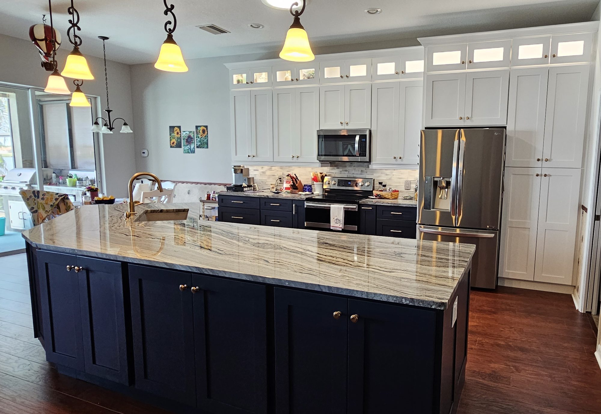 White kitchen with navy island